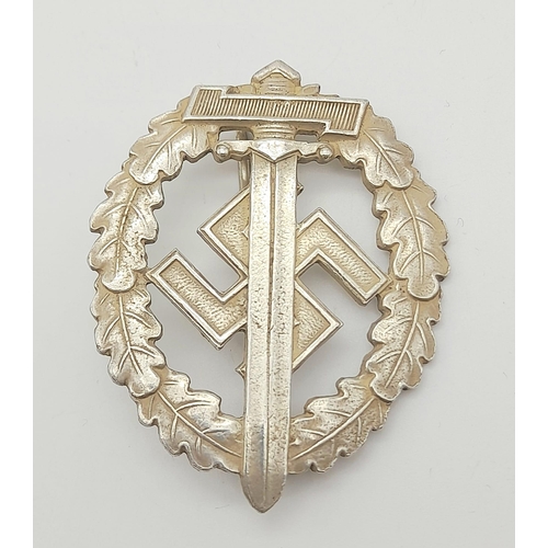 349 - WW2 German SA Disabled Veterans Sports Badge. A silver grade example depicting a Roman broad sword, ... 