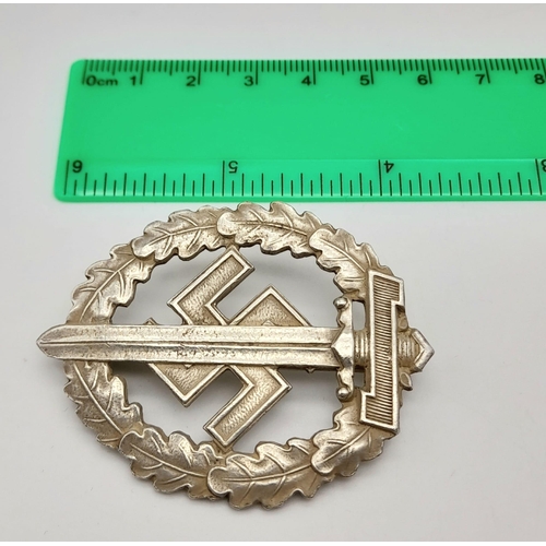 349 - WW2 German SA Disabled Veterans Sports Badge. A silver grade example depicting a Roman broad sword, ... 