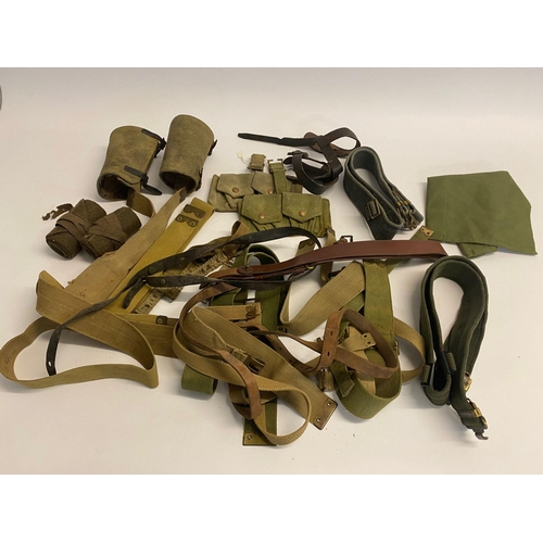 494 - Assorted lot of ww2 British militaria which includes ammo pouches, putties, gators, belts and more. ... 