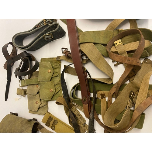 494 - Assorted lot of ww2 British militaria which includes ammo pouches, putties, gators, belts and more. ... 