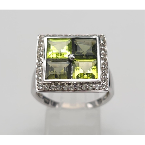 710 - An Unworn Limited Edition (1 of 100) Sterling Silver Moldavite, Peridot & White Topaz Set Ring, Size... 