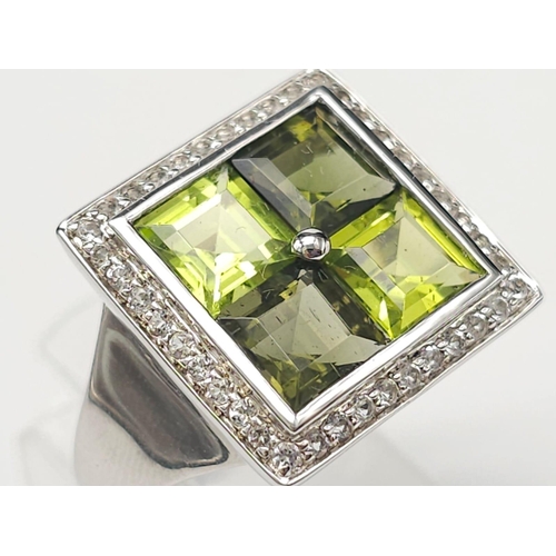 710 - An Unworn Limited Edition (1 of 100) Sterling Silver Moldavite, Peridot & White Topaz Set Ring, Size... 