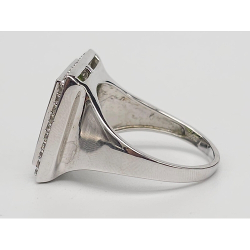 710 - An Unworn Limited Edition (1 of 100) Sterling Silver Moldavite, Peridot & White Topaz Set Ring, Size... 