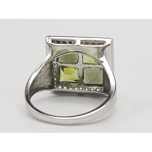 710 - An Unworn Limited Edition (1 of 100) Sterling Silver Moldavite, Peridot & White Topaz Set Ring, Size... 