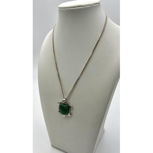 388 - A Green Jade Turtle Pendant on a 925 Silver Necklace. Pendant - 4cm. Necklace - 42cm.