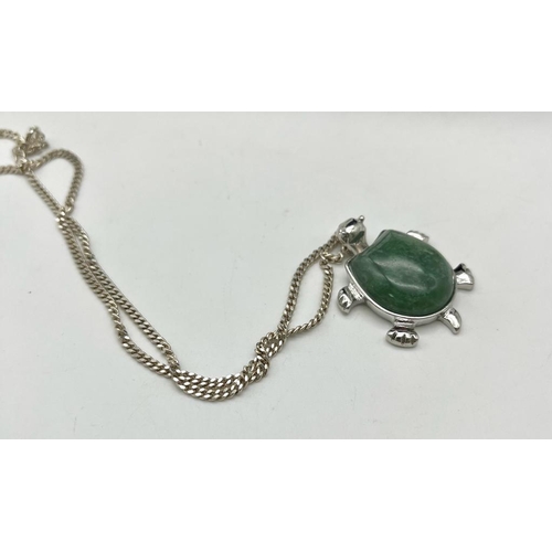 388 - A Green Jade Turtle Pendant on a 925 Silver Necklace. Pendant - 4cm. Necklace - 42cm.