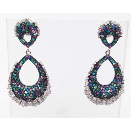 389 - A Pair of Silver Multi-Coloured Gemstone Oval-Drop Earrings.
3.5cm drop.