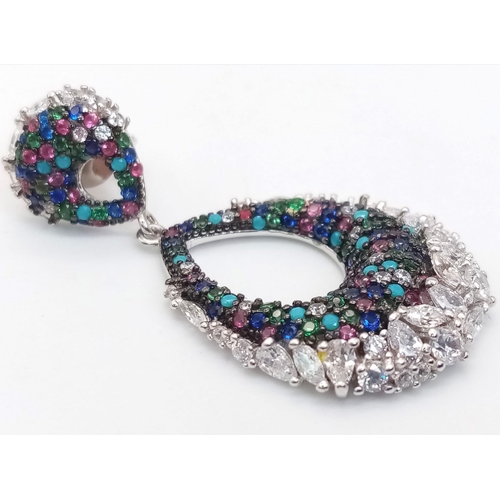 389 - A Pair of Silver Multi-Coloured Gemstone Oval-Drop Earrings.
3.5cm drop.