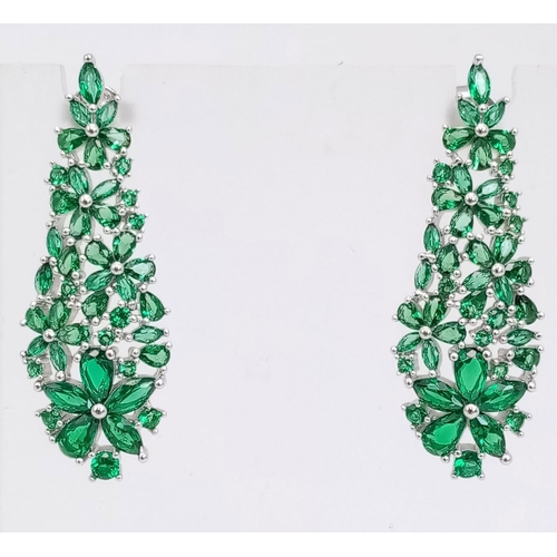 437 - A Pair of Silver and Green Stone Drop Earrings. 3.5cm drop.