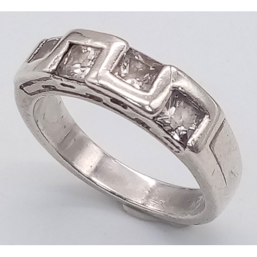 464 - A 925 Silver And White Stone Band Ring. Total Weight 5.66g. Size N.