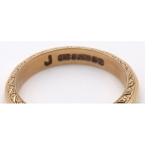 529 - 9k yellow gold 2mm band with patterned edges, 2.5g, size J