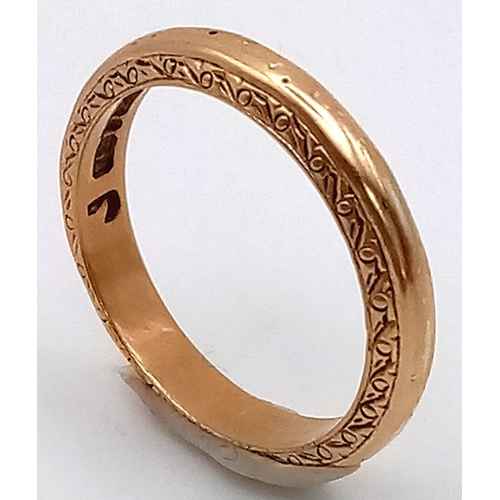 529 - 9k yellow gold 2mm band with patterned edges, 2.5g, size J