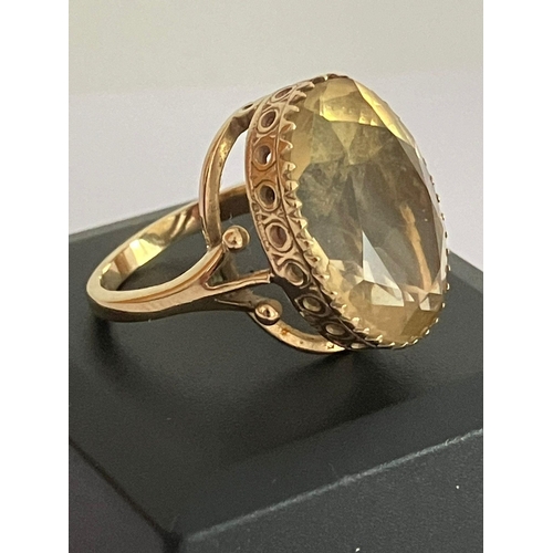 14 - Fabulous 8 carat oval cut CITRINE set in a 9 carat yellow GOLD RING. The ring having a beautiful Reg... 