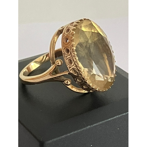 14 - Fabulous 8 carat oval cut CITRINE set in a 9 carat yellow GOLD RING. The ring having a beautiful Reg... 