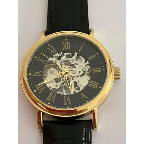 174 - Gentlemans STUHRLING SKELETON WRISTWATCH from  MAX STUHRLING of  NEW YORK, Finished in gold tone ove... 