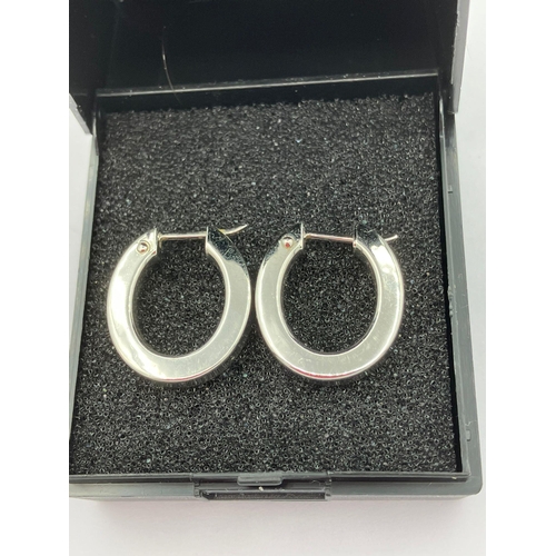 181 - Pair of 9 carat chunky WHITE GOLD HOOP EARRINGS. 1.96 grams. 2cm x 1.5 cm.