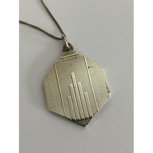 315 - Vintage ART DECO SILVER LOCKET in hexagonal form mounted on a silver chain. Chain 45 cm. Locket 4 cm... 