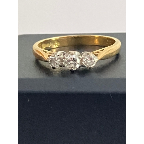 35 - 18 carat yellow GOLD and DIAMOND RING, Having three sparkling clear white DIAMONDS  (0.29 carat) set... 