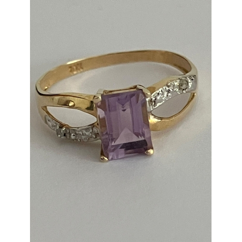 392 - 2 x 10 Carat GOLD RINGS , The first set to top with Emerald cut Amethyst,the second  with faux Opal.... 