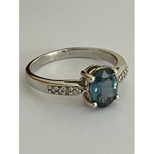 399 - Beautiful SILVER and AQUAMARINE SOLITAIRE RING, Having an oval cut Aquamarine Gemstone mounted to to... 