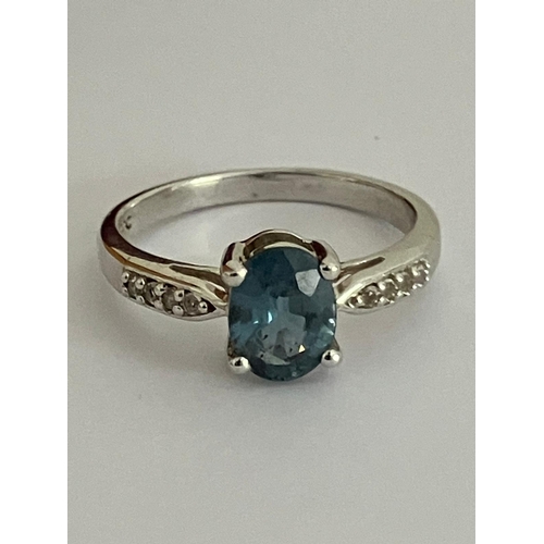 399 - Beautiful SILVER and AQUAMARINE SOLITAIRE RING, Having an oval cut Aquamarine Gemstone mounted to to... 