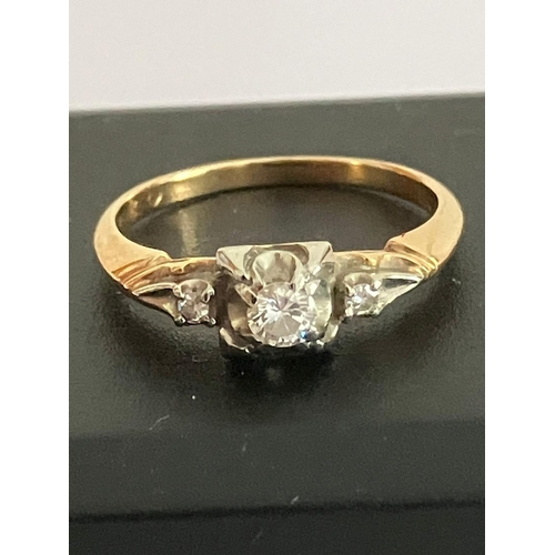 7 - 14 carat GOLD RING set with sparkling 0.2 carat DIAMOND to centre in stylised mount and having furth... 