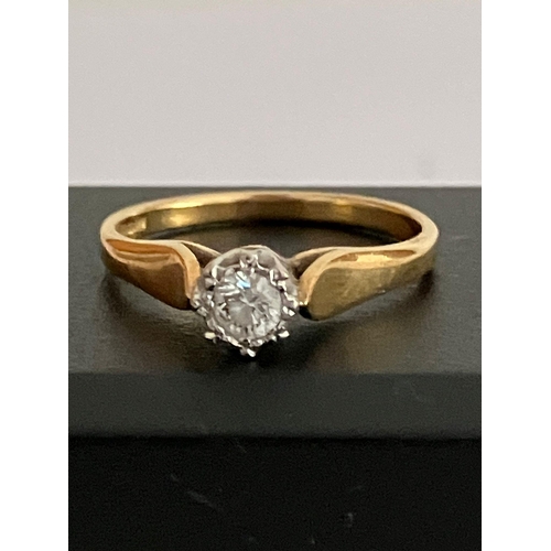 91 - Hallmarked 18 carat yellow GOLD and DIAMOND SOLITAIRE RING. Having an 0 .25 carat DIAMOND set to top... 