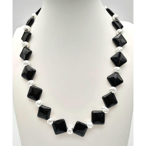 401 - A Polished Black Agate Square Bead Necklace with Fancy Silver-Coloured Glitter-ball Spacers. Necklac... 