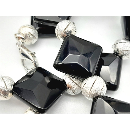 401 - A Polished Black Agate Square Bead Necklace with Fancy Silver-Coloured Glitter-ball Spacers. Necklac... 