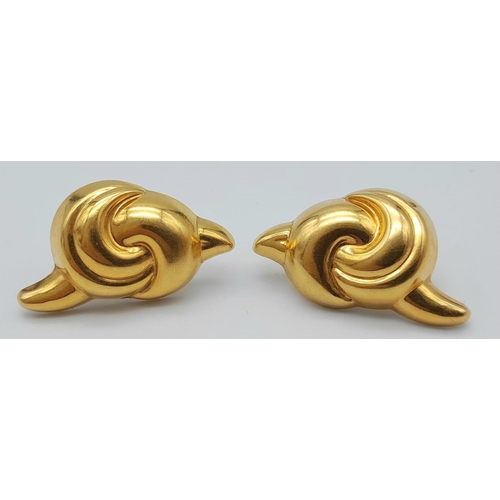 157 - A PAIR OF 18K GOLD EARRINGS INA CELTIC KNOT DESIGN.   5.5gms