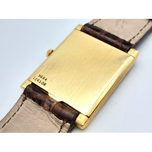 267 - A Classic Piaget Mechanical Tank Watch. Brown leather strap. Gold plated case - 23mm width. White di... 