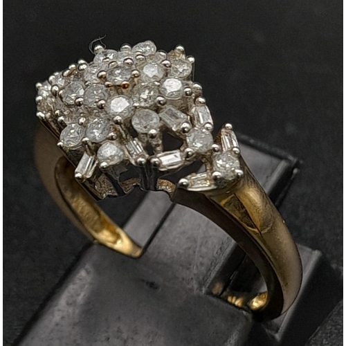 313 - 9K YELLOW GOLD DIAMOND CLUSTER RING.  0.50CT DIAMOND. TOTAL WEIGHT 2.8G.  SIZE L