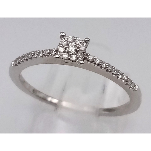 544 - A 9K WHITE GOLD DIAMOND RING 0.14CT 2.1G SIZE R