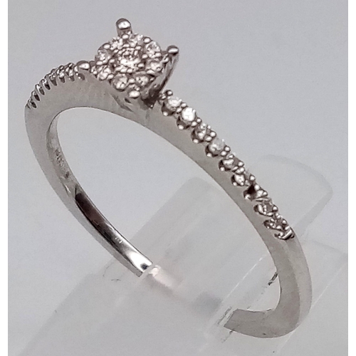 544 - A 9K WHITE GOLD DIAMOND RING 0.14CT 2.1G SIZE R