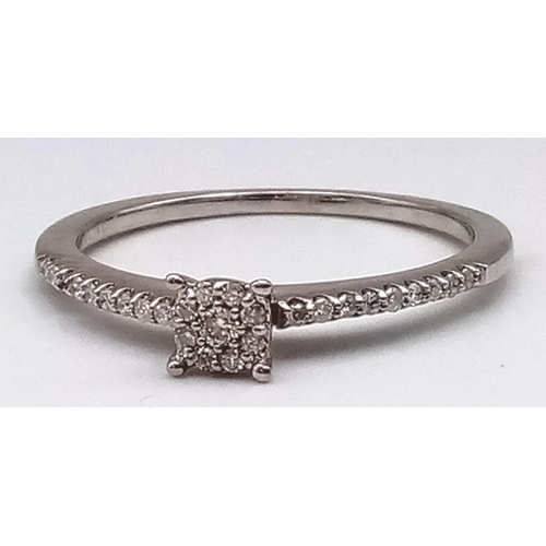 544 - A 9K WHITE GOLD DIAMOND RING 0.14CT 2.1G SIZE R