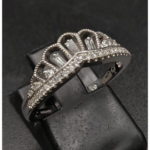 60 - PLATINUM DIAMOND SET CROWN RING. DESIGNED BY EMMY LONDON. TOTAL WEIGHT 4.5G.  SIZE L