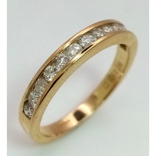 285 - A 9K YELLOW GOLD DIAMOND SET 1/2 ETERNITY RING 0.50CT 2.5G SIZE O