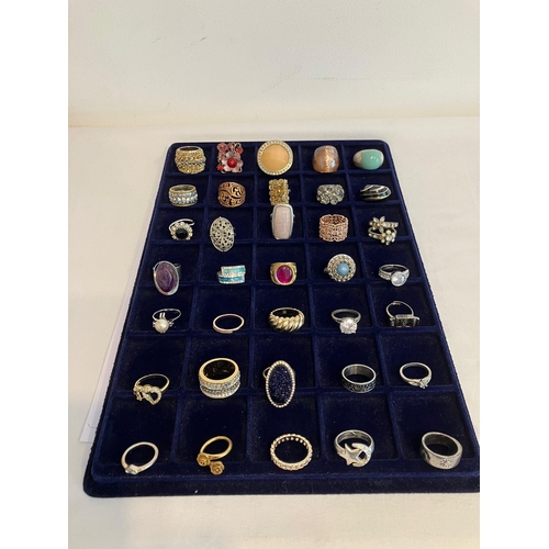 329 - Large selection of DRESS RINGS to  include Jewelled, Silver Tone and Gold Tone together with an asso... 