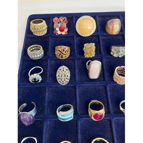 329 - Large selection of DRESS RINGS to  include Jewelled, Silver Tone and Gold Tone together with an asso... 