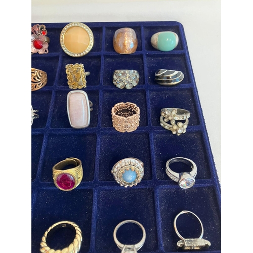 329 - Large selection of DRESS RINGS to  include Jewelled, Silver Tone and Gold Tone together with an asso... 