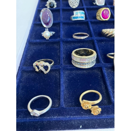 329 - Large selection of DRESS RINGS to  include Jewelled, Silver Tone and Gold Tone together with an asso... 