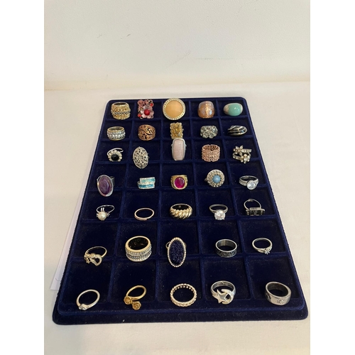 329 - Large selection of DRESS RINGS to  include Jewelled, Silver Tone and Gold Tone together with an asso... 