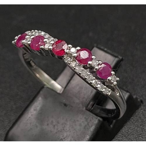 396 - 9K WHITE GOLD DIAMOND & RUBY TWIST CROSSOVER RING 2.3G SIZE R