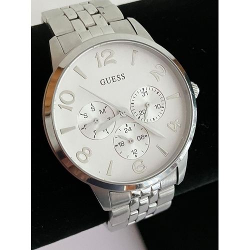 284 - Gentlemans GUESS QUARTZ WRISTWATCH Multi dial model finished in silver tone stainless steel. Bracele... 