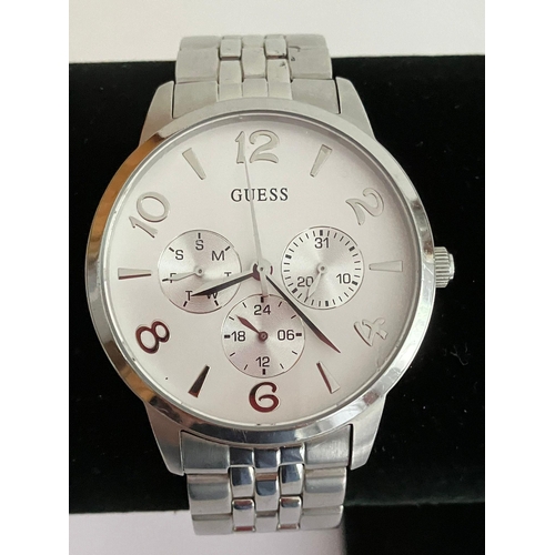 284 - Gentlemans GUESS QUARTZ WRISTWATCH Multi dial model finished in silver tone stainless steel. Bracele... 