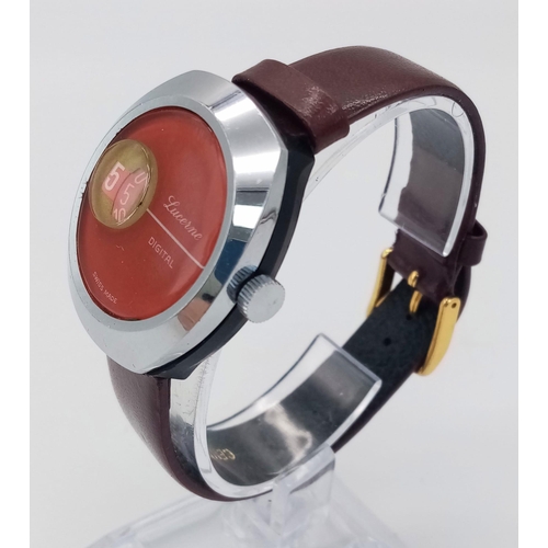 206 - A Rare Vintage Lucerne Jump Watch. Burgundy leather strap. 
Case - 33mm. Red dial with jump window. ... 