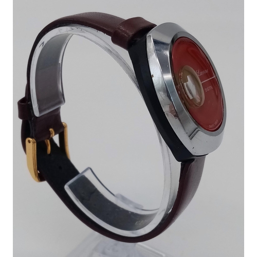 206 - A Rare Vintage Lucerne Jump Watch. Burgundy leather strap. 
Case - 33mm. Red dial with jump window. ... 