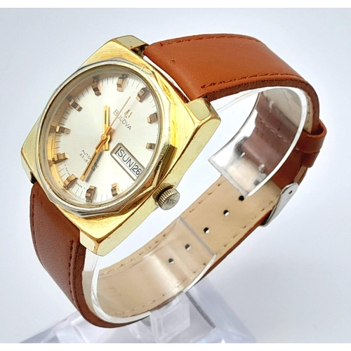 213 - A Vintage Bulova 23 Jewel Automatic Gents Watch. Brown leather strap. Two-tone case - 36mm. Silver t... 