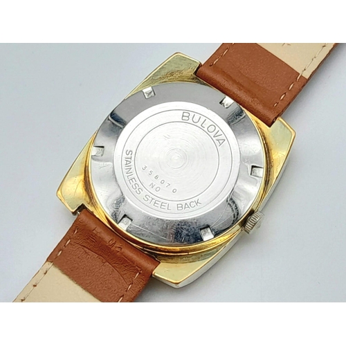 213 - A Vintage Bulova 23 Jewel Automatic Gents Watch. Brown leather strap. Two-tone case - 36mm. Silver t... 