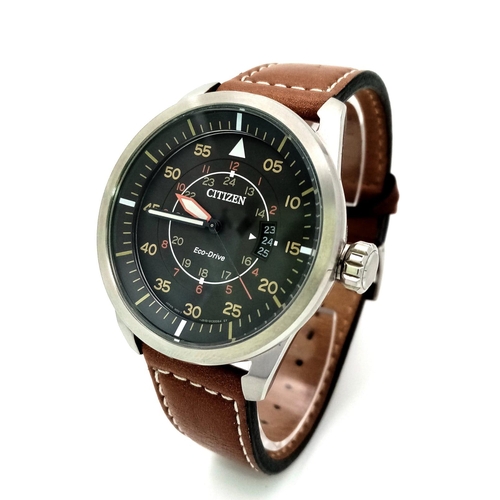 379 - A Citizen Eco Drive Gents Watch. Brown leather citizen strap. Stainless steel case - 45mm. Black dia... 